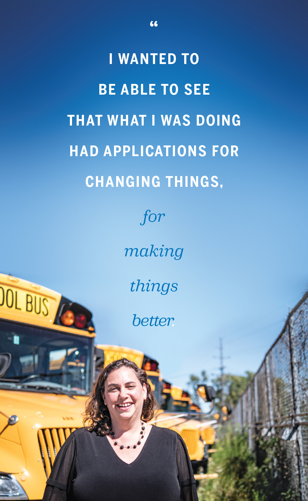 Sara Adar stands in front of Ann Arbor School District buses on August 31, 2023, with the quote I wanted to be able to see that what I was doing had applications for changing things, for making things better.