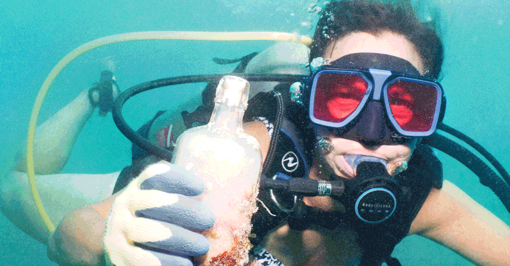 Kris Sarri scuba diving