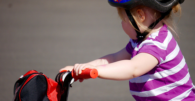 little girl riding a bike