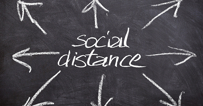 chalkboard arrows and the words "social distance"