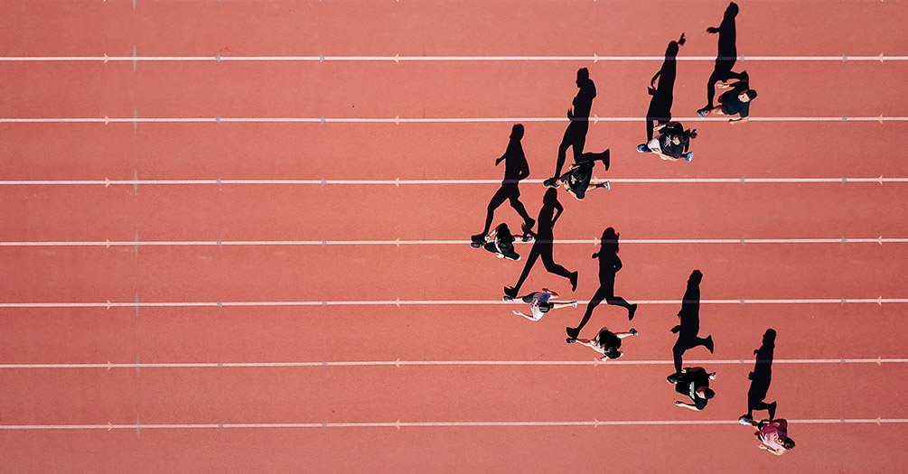 People running on a track.