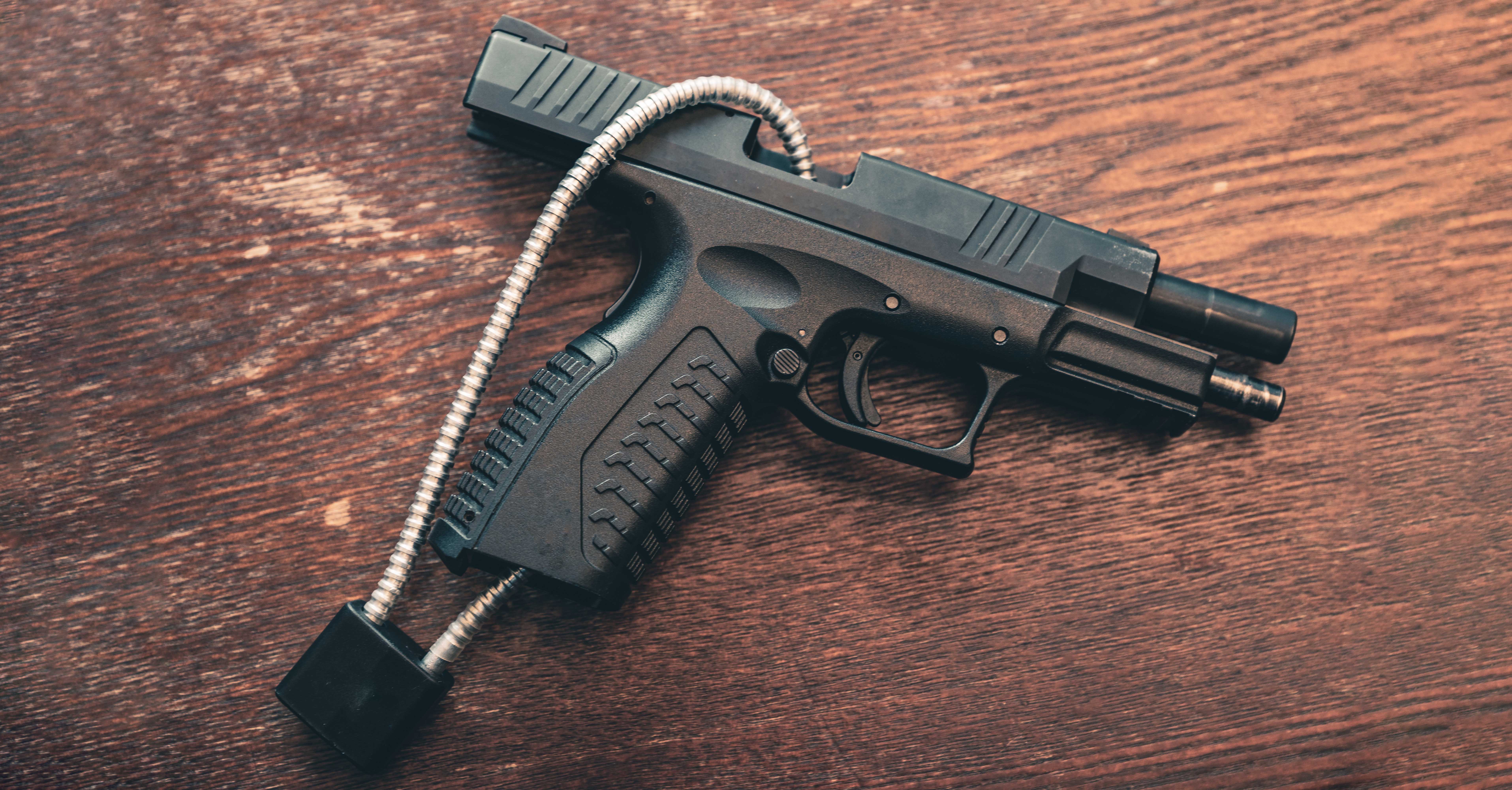 A firearm with a cable lock