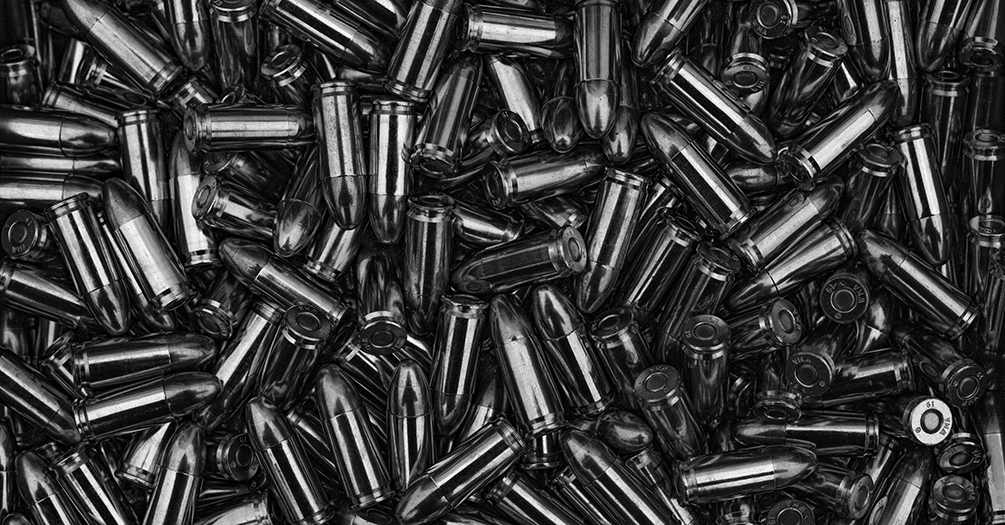 Black and white image of gun bullets.