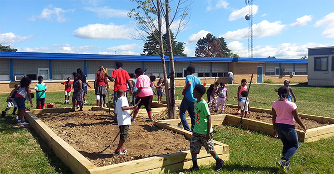 A large garden project at Hamady Middle School in Flint, Michigan, co-facilitated by Youth Empowerment Solutions (YES)