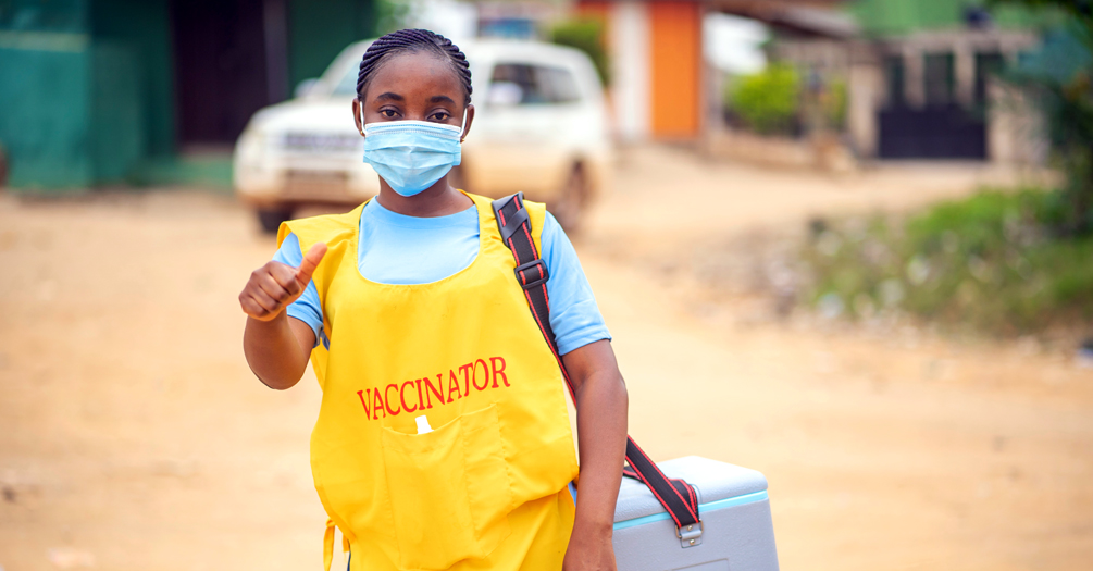 Public health worker in Africa distributing vaccines