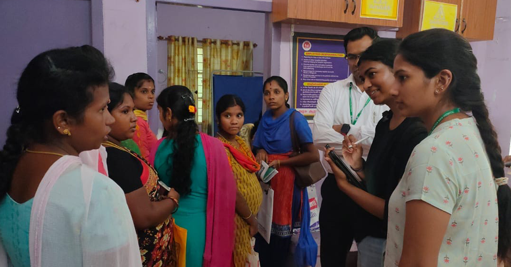 Sahana Raja asking pregnant mothers about their determinants of health at a primary healthcare center in the rural village of Mopperipalayam, India.