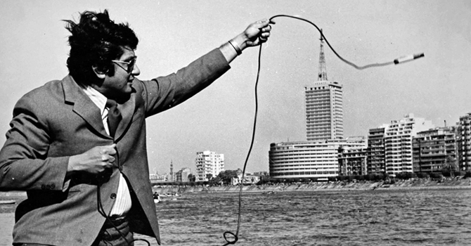 Khalil Hosny Mancy, professor emeritus of Environmental Health Sciences, lowers an oxygen sensor into the Nile River as it runs through Cairo in 1971.